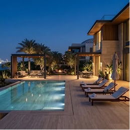 Landscaped outdoor garden patio and private swimming pool terrace on Saadiyat Island