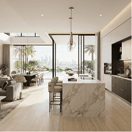 Modern open-plan kitchen and dining space with Italian cabinetry and marble island